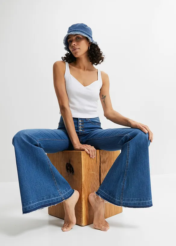 Jeans med sleng og åpne kanter nederst, bonprix