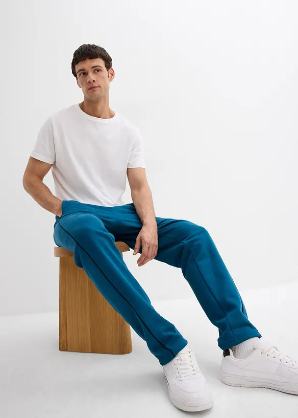 Sweatbukse av 100% bomull med kontrastdetaljer, bonprix