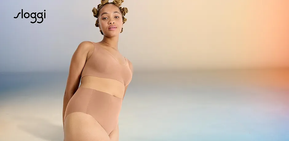 Nude bodysuit fra Sloggi fremhever bærerens naturlige silhuett.