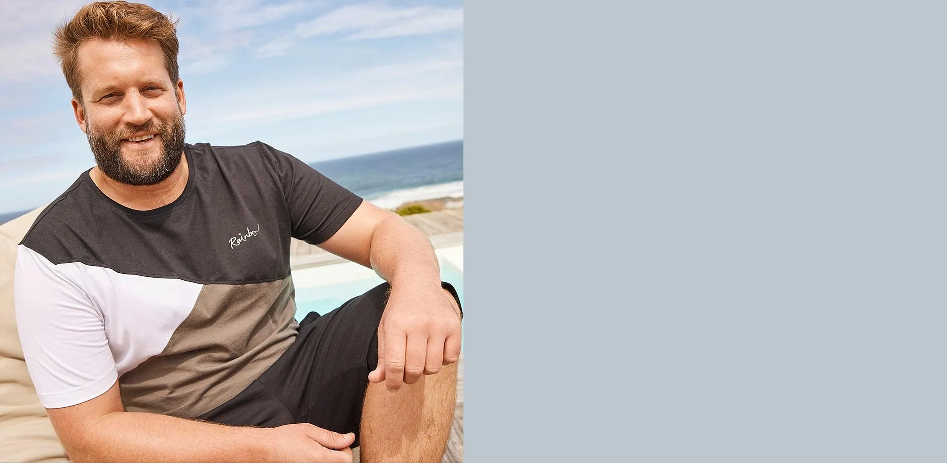 Colorblocking T-skjorte og behagelig shorts for en avslappet strandstil.