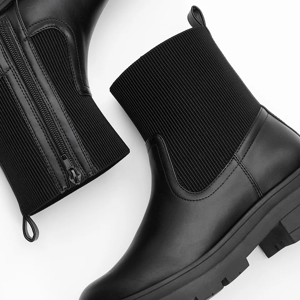 Elegante, sorte boots.