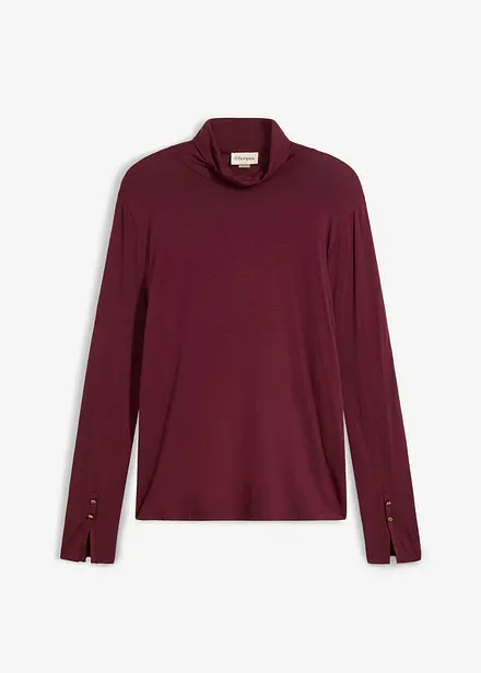 Pologenser med dekorative knapper