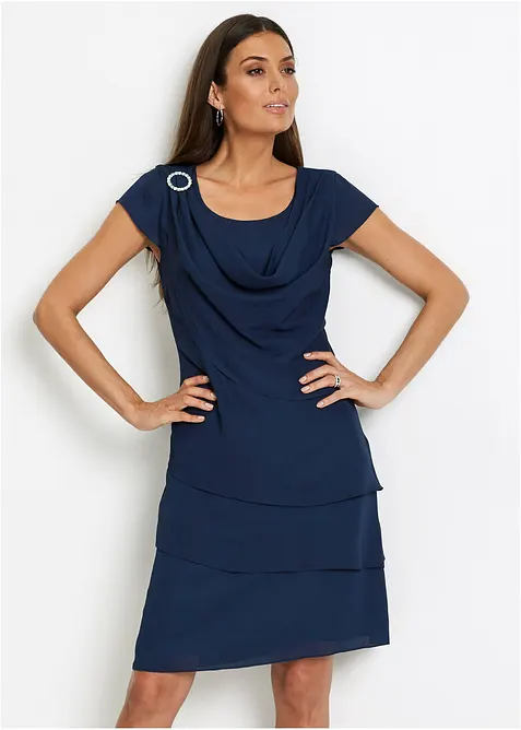 Minikjole i lag-på-lag look med dekorativt tilbehør, bonprix