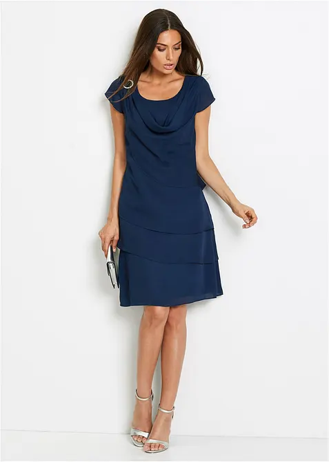 Minikjole i lag-på-lag look med dekorativt tilbehør, bonprix