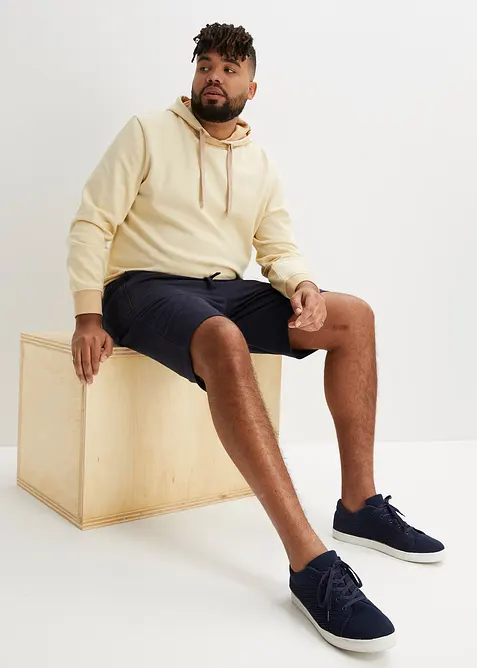 Sweat-bermudashorts med praktiske glidel&aring;slommer, bonprix