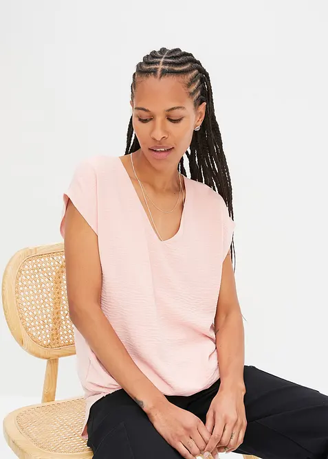 Ermeløs topp med lengre bakstykke, bonprix