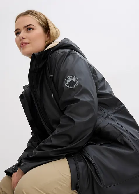 Regnjakke med teddyfôr, av vanntett materiale, bonprix