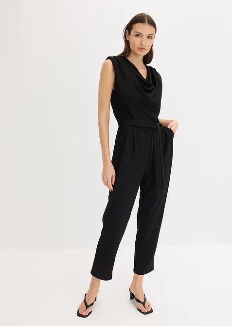 Jersey jumpsuit med skulderpolstring, bonprix