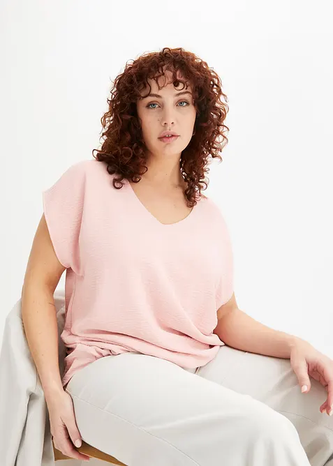 Ermeløs topp med lengre bakstykke, bonprix