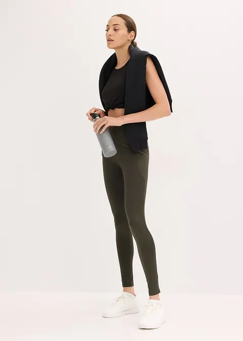 Varmende leggings med refleksdetaljer og mobillomme, bonprix