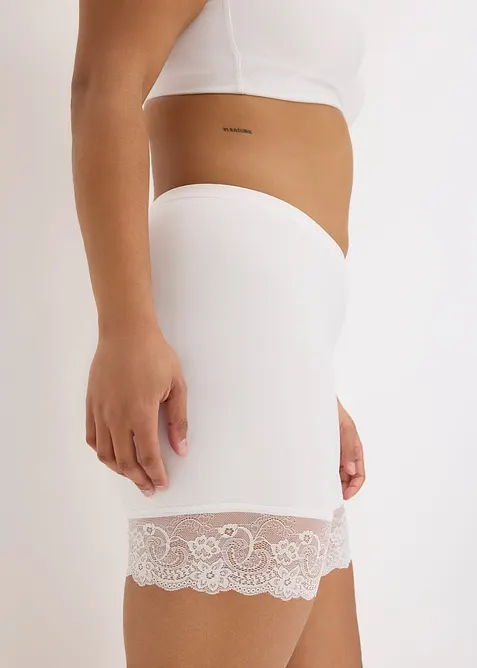 Truse med ben og "anti-gnisse"-effekt i kj&oslash;lende polyamid med blondekanter p&aring; bena, bonprix