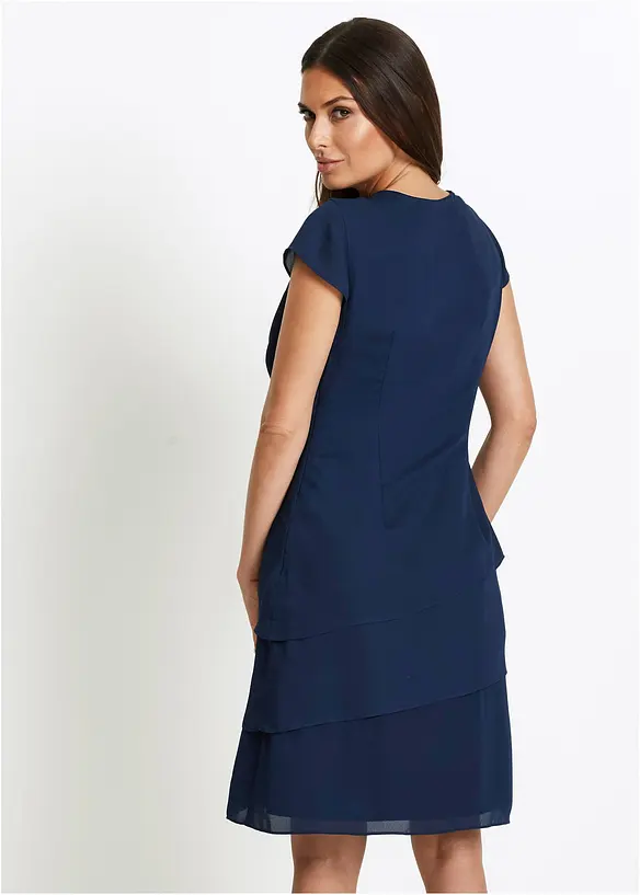 Minikjole i lag-på-lag look med dekorativt tilbehør, bonprix