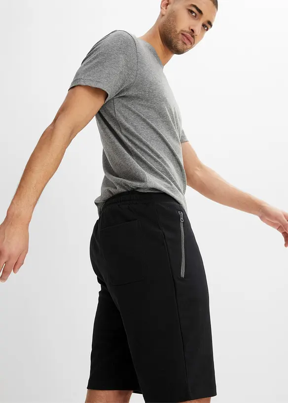 Sweat-bermudashorts med praktiske glidel&aring;slommer, bonprix