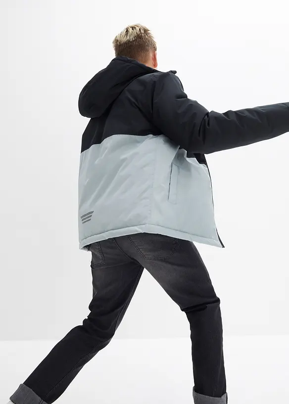 Vinterjakke i vanntett materiale med colorblocking effekt og hette, bonprix