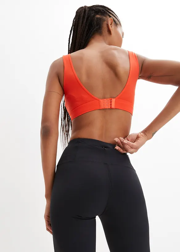 Shape-treningsbukse med lomme, utskrådde ben, bonprix