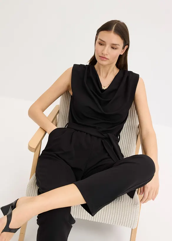 Jersey jumpsuit med skulderpolstring, bonprix
