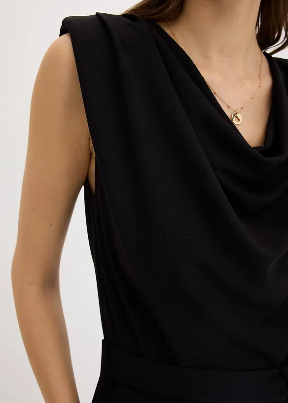 Jersey jumpsuit med skulderpolstring, bonprix