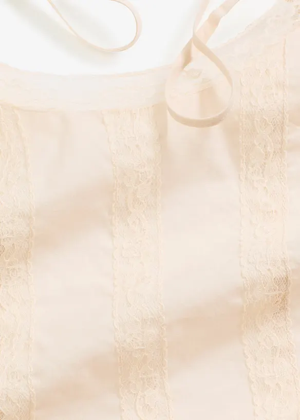 Ermeløs bluse i 100% bomull med hullbroderi, bonprix