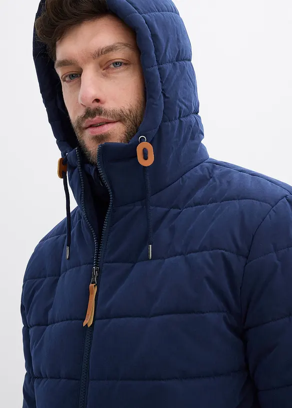 Vattert parkas med hette og detaljer i imitert skinn, bonprix