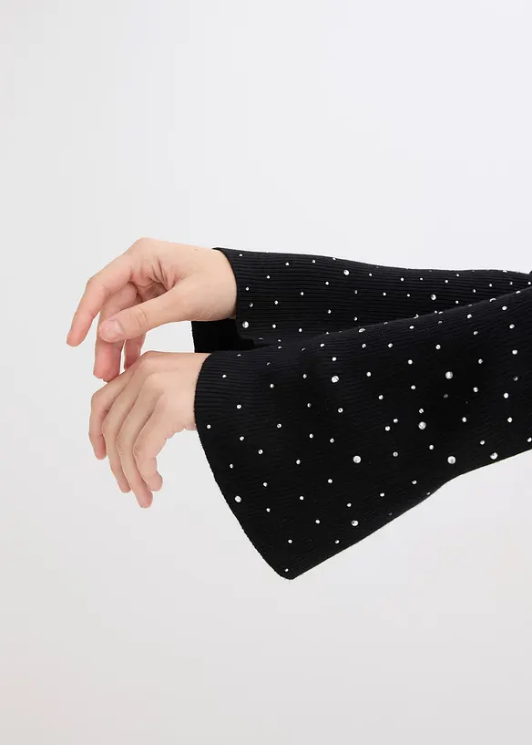 Finstrikket genser med fint pyntede trompetermer, bonprix