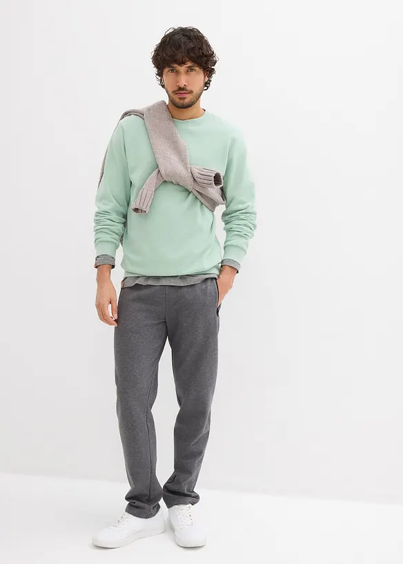 Joggebukse med praktiske glidelåslommer av økologisk bomull, bonprix