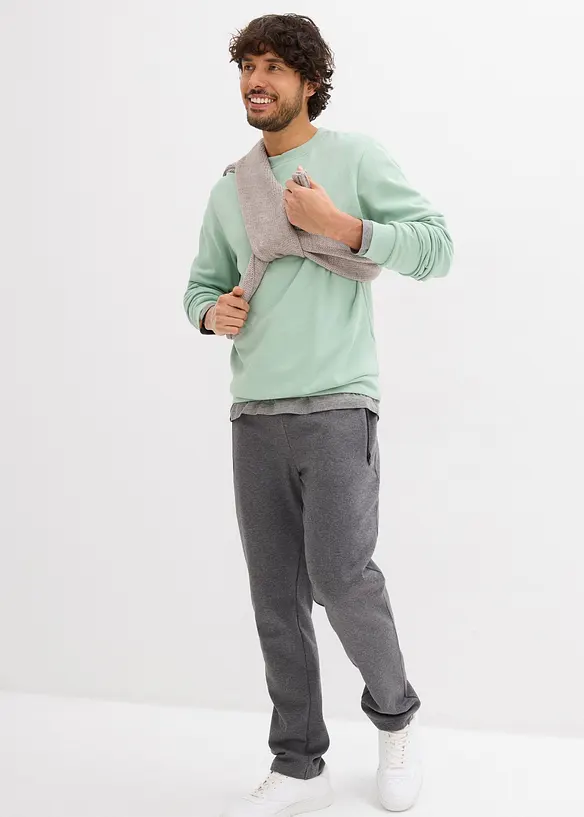 Joggebukse med praktiske glidelåslommer av økologisk bomull, bonprix