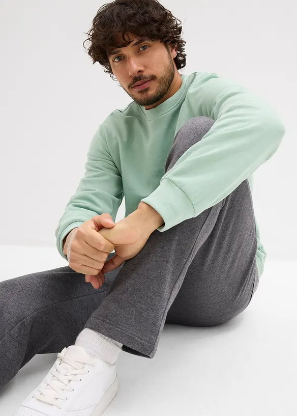 Joggebukse med praktiske glidelåslommer av økologisk bomull, bonprix