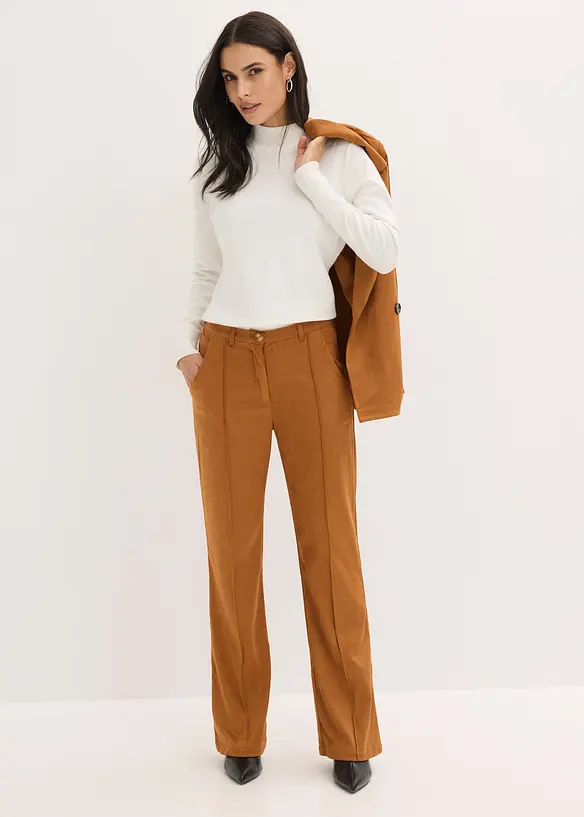 Flared bukse i imitert, semsket skinn, bonprix