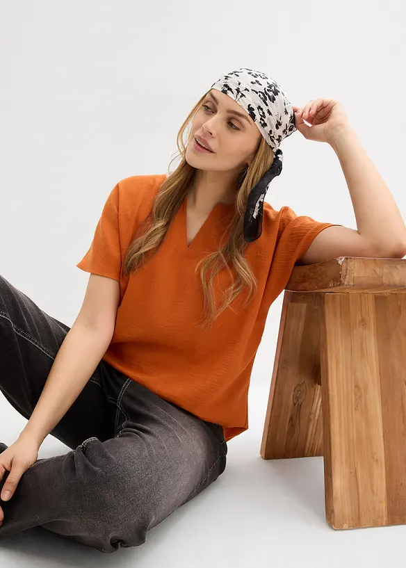 Oversized bluse med elastisk nederkant, bonprix