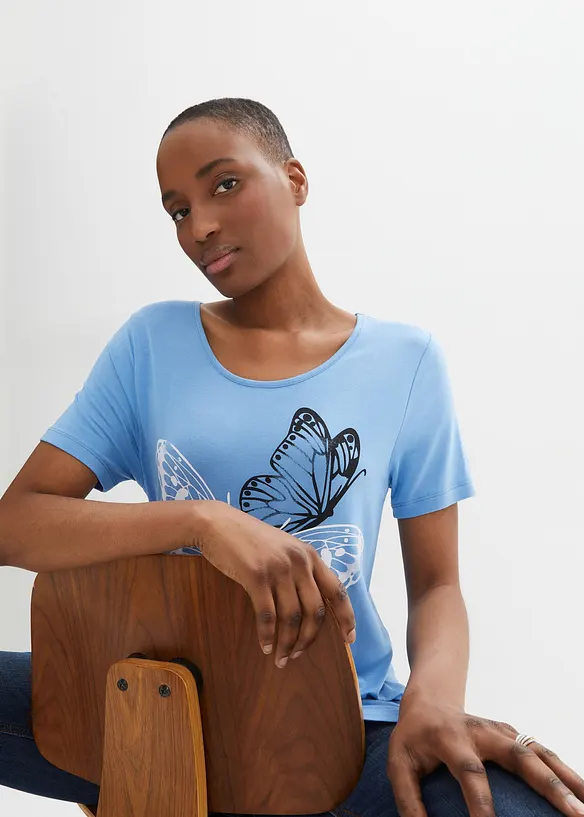 Lang topp med snipper i falden og sommerfugler, bonprix