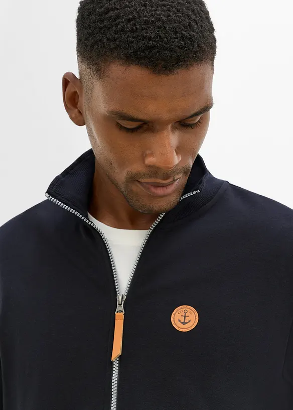Sweatjakke med detaljer i imitert skinn, bonprix
