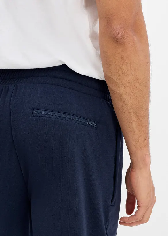 Varm joggebukse med glidel&aring;slommer, bonprix