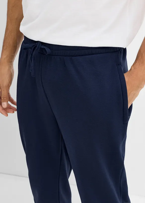 Varm joggebukse med glidel&aring;slommer, bonprix