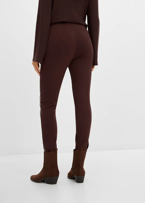 Leggings i imitert skinn med innsnitt med kneet, bonprix