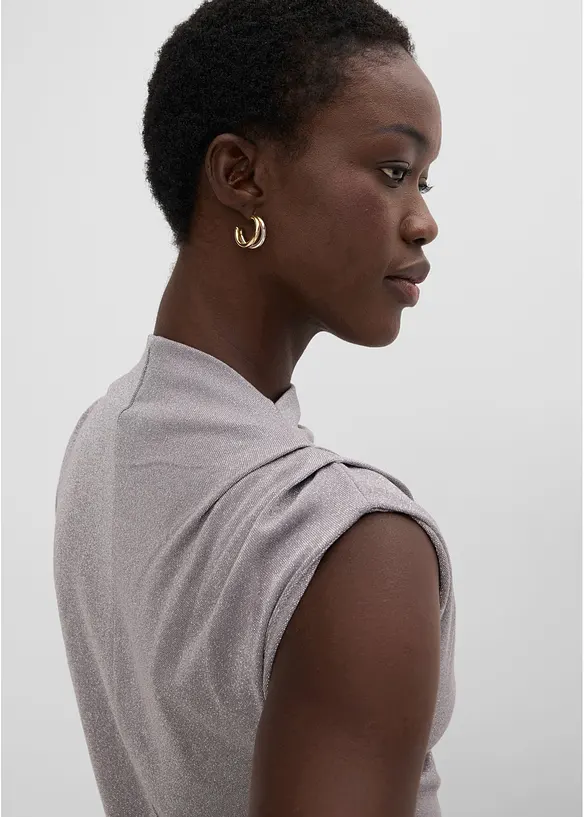 Topp med asymmetrisk nederkant og glitter, bonprix
